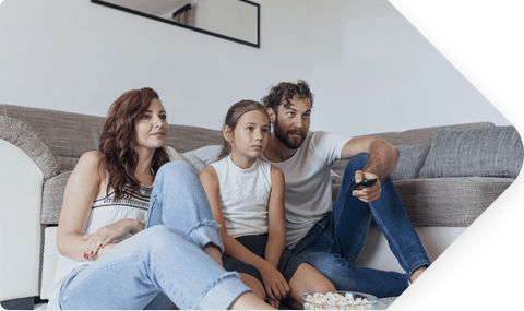 Family Choosing Programming from TV Guide